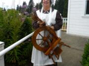 Amboy: Sandra Ferneding demonstrated her skills on the spinning wheel at the North Clark Folk Fest and Craft Show on Aug.