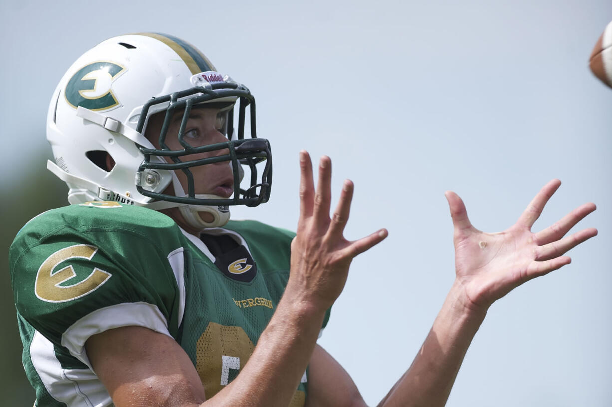 Evergreen's Trent Foster makes a catch during practice on Monday August 20, 2012.