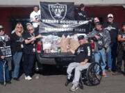 Brush Prairie: The Raiders Booster Club of Washington State brought in about 700 pounds of food for the Clark County Food Bank during a charity drive Oct.