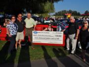 Woodland: Rose City Classics presented $40,000 to the Ray Hickey Hospice House, a program of PeaceHealth Southwest Medical Center, on July 25. Most of the money was raised at the Woodland Planters Days Cruise In in June.