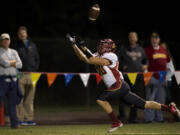 Taylor Martin of Prairie High School catches a touchdown pass against Skyview High School at Kiggins Bowl on Friday in Vancouver.