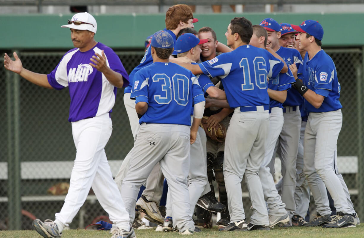 Manhattan Beach Little League celebrates after beating Central East Maui Little League for the Little League Junior Boys Western Regional Tournament championship at Propstra Stadium, Wednesday, August 8, 2012.