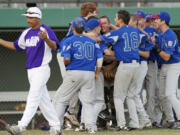 Manhattan Beach Little League celebrates after beating Central East Maui Little League for the Little League Junior Boys Western Regional Tournament championship at Propstra Stadium, Wednesday, August 8, 2012.