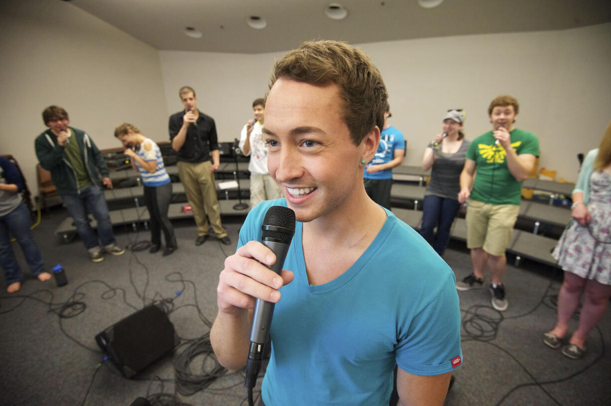 Nathan Jenisch sings a solo during a rehearsal of the Clark College Jazz Ensemble.