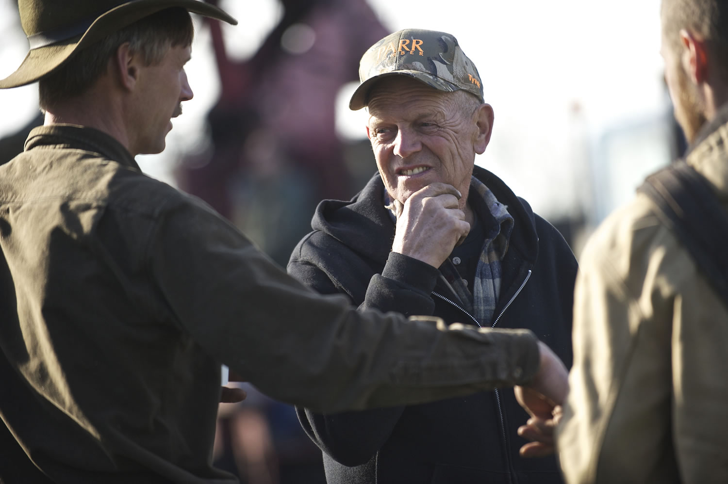 John Matson confers with his son Walt. &quot;This is overwhelming,&quot; the elder Matson said.