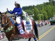 2013 Miss Vancouver Rodeo Queen Brittney Williams rides Saturday in the Hockinson Fun Days Parade.