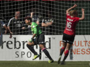 Goalkeeper Karina LeBlanc celebrates after saving penalty kick taken by Abby Wambach, during the second half of the Thorns FC game on Sunday.