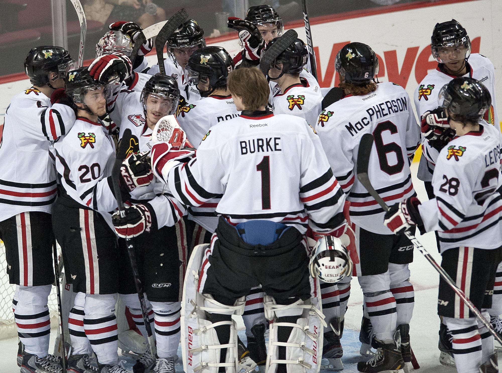 Winterhawk goaltender Brendan Burke joins his team on the ice after a win against the Spokane Chiefs last season.