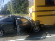 Battle Ground Public Schools
A car struck the rear of a Battle Ground Public Schools bus early Thursday afternoon when the bus stopped at a railroad along Highway 503.