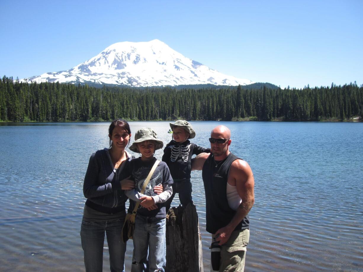 The Forest family: Ginille, 32, from left; Kaiden, 10; Tristan, 5; and Nathaniel, 34. Ginelle's book &quot;Daddy's Different,&quot; explains a parent's traumatic brain injury to children.