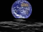 This composite image of the full Earth was created from of taken Oct. 12 by the Lunar Reconnaissance Orbiter as it orbited the moon. A full moon will shine on Earth on Thursday night and Christmas morning.