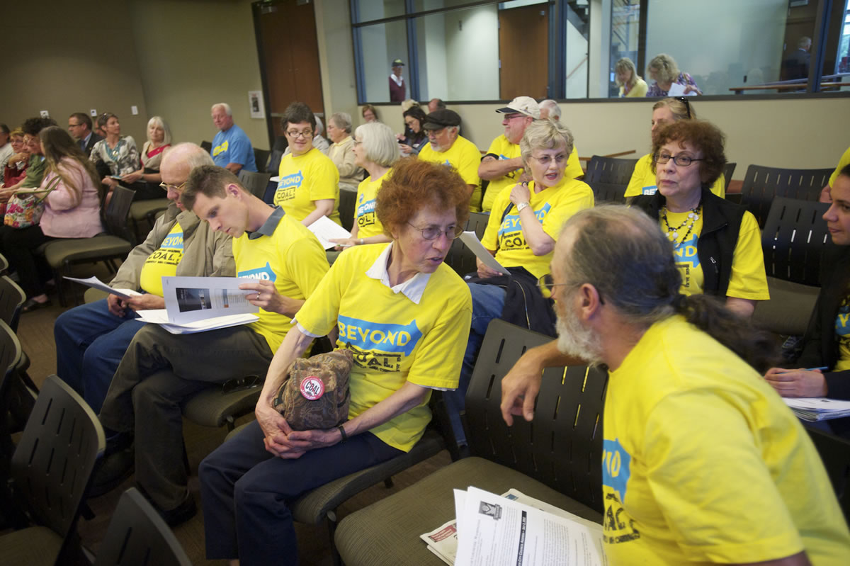 Protesters opposing shipments of coal by train attend a workshop session Monday at Vancouver City Hall.