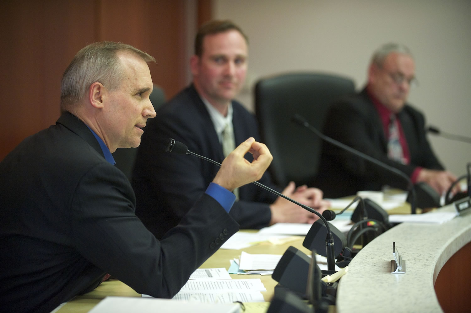 Clark County Commissioner David Madore, foreground, addresses an issue at a Clark County Commissioners meeting at the Clark County Public Services Center Tuesday.