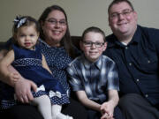 Beth and Thomas Cooper are still paying off their own higher-education loans, which is why they've prioritized saving for college for 9-year-old Jace and 18-month-old Lila.