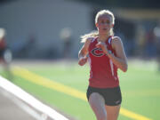 Camas High sophomore Alexa Efraimson finishes first in the 4A girls 1600 at the district track and field meet at McKenzie Stadium on May 9, 2013.