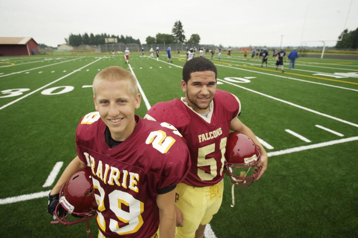 Prairie football players Jesse Zalk, left, and Austin Fuller are representing the Falcons in the Freedom Bowl Classic.