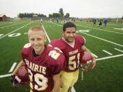 Prairie football players Jesse Zalk, left, and Austin Fuller are representing the Falcons in the Freedom Bowl Classic.