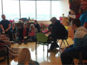 Heritage High School: Volunteers with Owl Be Better With Music share healing tunes with patients at Shriners Hospital in Portland.