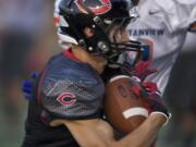 Camas High's Zach Eagle pulls down the first of his two interceptions against Auburn Mountainview on Friday.