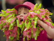 Olivia Petersen, 10, has fun with pompoms at a recent rehearsal for performance team DANA's Dreamers.