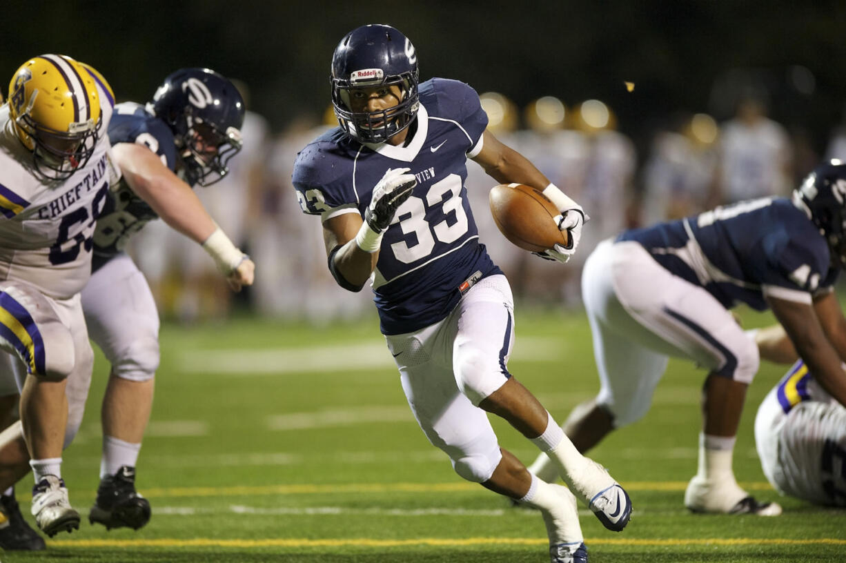 Jabari Marshall, 33, of Skyview High School scores a touchdown in the first half against Columbia River High School at Kiggins Bowl Friday September 7, 2012 in Vancouver, Washington.