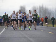 The start of the Vancouver Lake Half Marathon at Vancouver Lake Park on Sunday.