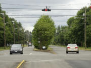 MacArthur Boulevard in the Vancouver Heights neighborhood, shown in this photograph looking east at the intersection with Andresen Road, will be resurfaced this summer as part of the city's pavement management program.