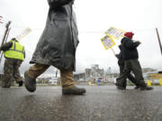 ILWU workers picket for a second day Thursday in front of the Port of Vancouver's Gate 2.