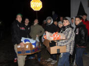 Camas: The Union High School wrestling team worked with Community Embraced Northwest to provide winter blankets, coats, hats, gloves and socks to the homeless at Dignity Village in Portland.