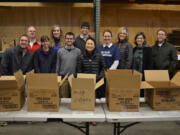 Esther Short: Staff members from LSW Architects volunteered their time with FISH of Vancouver recently, helping to sort through food donated to the shelter.