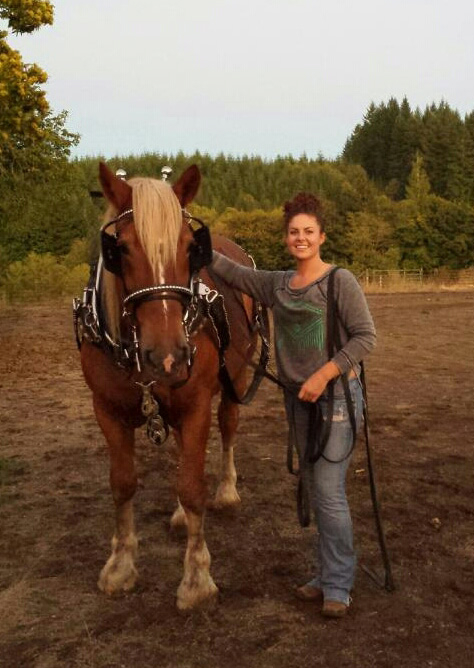 Roxanne Esteb, shown in this undated photo next to her sister&#039;s horse, Magnificent George, is credited with saving two people from their burning home Saturday night.