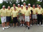 Camas Meadows: The winning team of the annual Pacific Lifestyle Homes &quot;Care Cup&quot; golf tournament holds its trophy on June 21 at Camas Meadows Golf Club.