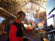 Sebastian Maher, 10, from Vancouver, plays the electric drums at the Rock U exhibit at the Clark County Fair on Friday. Balancing new technology and urban life with agricultural roots is a constant challenge at the Clark County Fair.