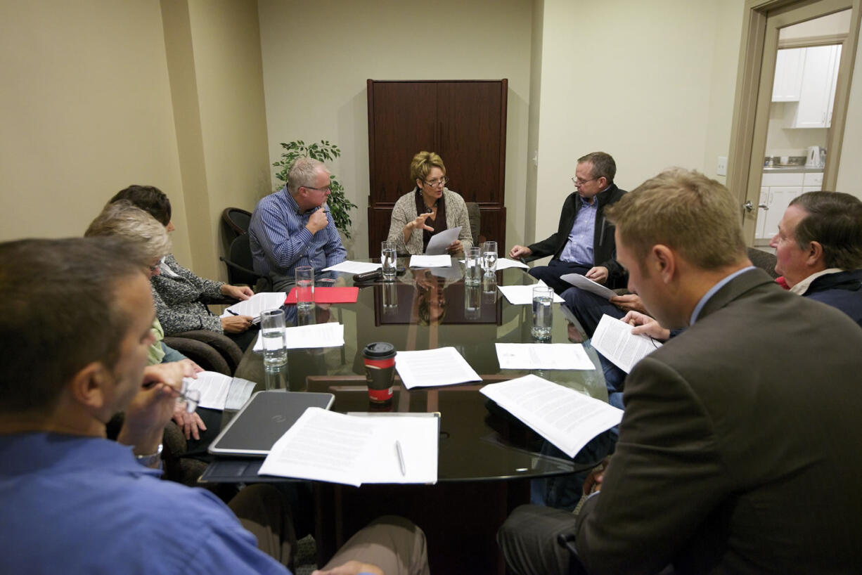 State Rep. Liz Pike, R-Camas, talks about government regulation on Wednesday with eight business leaders from Clark County.