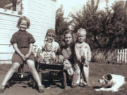 Gwen, from left, Harley (holding Linda), Kay and Dennis Hall, with Spot.