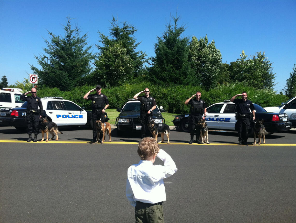 Honorary Sheriff Carter Harris met the regional police K-9 group on Aug.