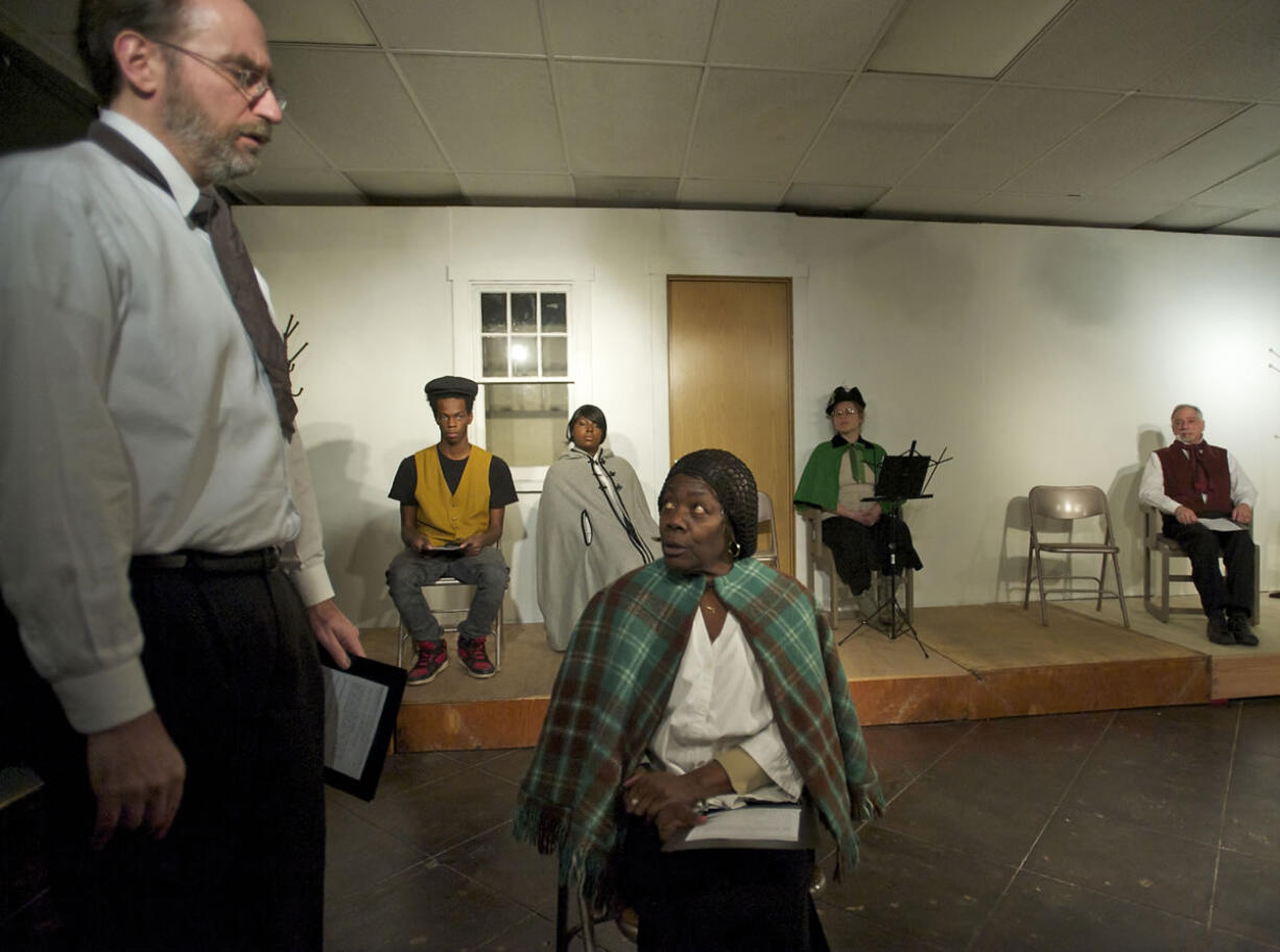 Mrs. Tutsono, portrayed by actress Rubi Williams, describes for the court her assault and whipping by the Ku Klux Klan, while a lawyer, portrayed by Tony Broom, listens in shock.