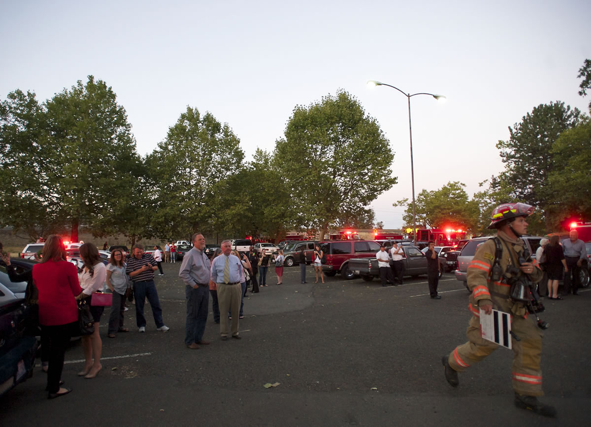 Firefighters respond to Who Song &amp; Larry's Restaurant and Cantina after fire broke out during the dinner rush at the waterfront business on Wednesday.