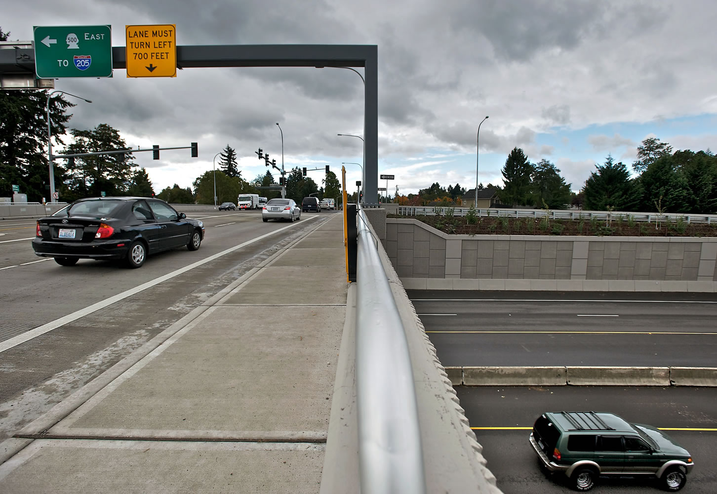 A car crosses over state Highway 500 on St. Johns Boulevard on Monday. A $48 million project completed this year elevated St.