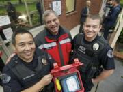 From left: Vancouver police Cpl. Doug Rickard, Vancouver Fire Department Capt.