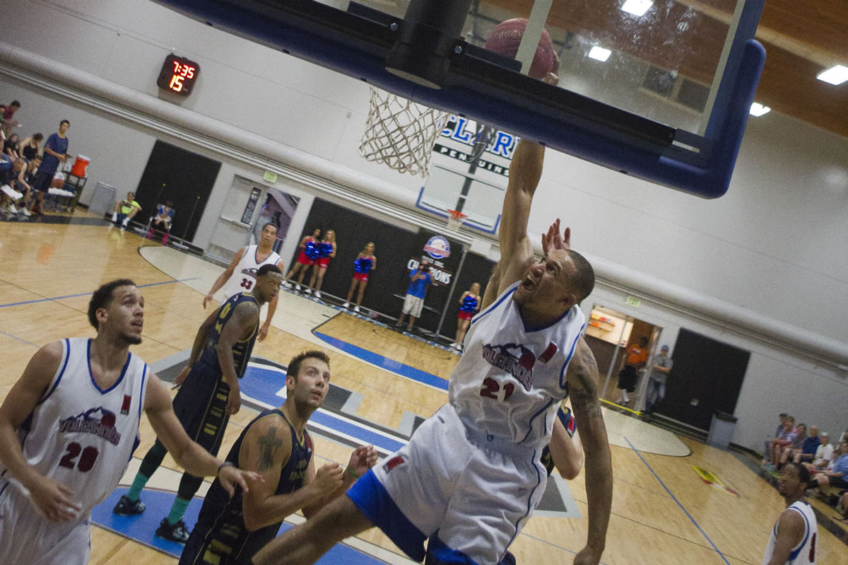 Vancouver's Kevan West (21) scored 13 points in the Volcanoes' win.