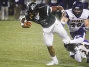 Portland State running back David Jones (3) is brought down by Northern Iowa defensive back Tim Kilfoy (24) and linebacker Jared Farley (46) during the first half of a second-round NCAA FCS playoff game at Providence Park on Saturday, Dec. 5, 2015, in Portland, Ore.