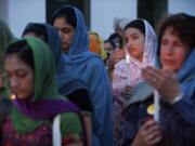 The Guru Ramdass Gurdwara Sikh temple in Vancouver hosted a candlelight vigil on Thursday in memory of the victims of a gunman who walked into a Sikh temple in Wisconsin and opened fire.