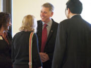 Washington State University Vancouver's new chancellor, Mel Netzhammer, received an enthusiastic welcome during a ceremony on Thursday.