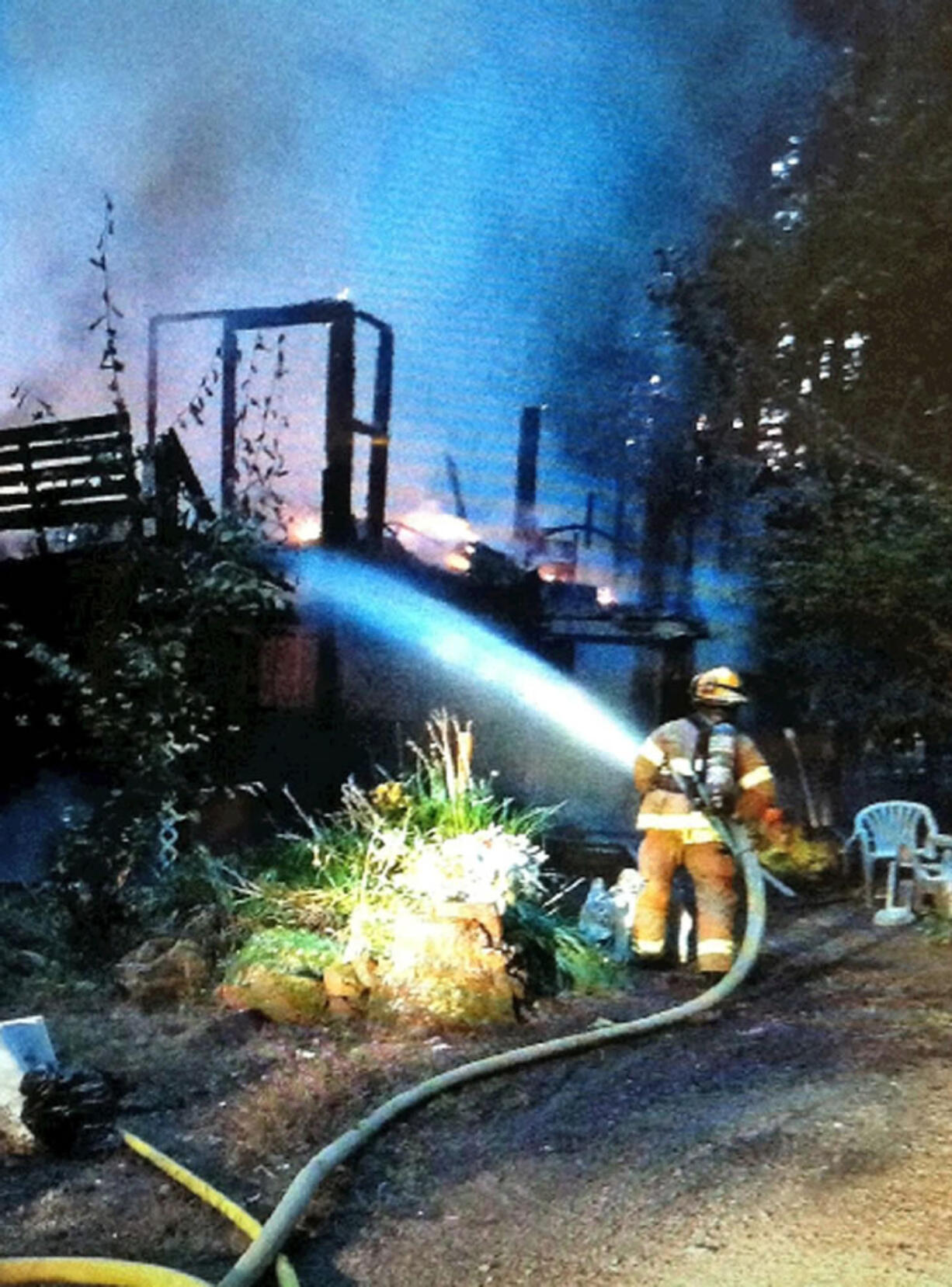 A woman, her dog and two cats escaped this Yacolt house fire, said Battalion Chief Jeff Stewart of Fire District 3.