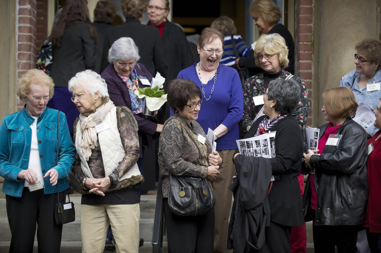 The whole group gathers for a photo on the front steps of The Academy; afterward there was lots of laughter and catching up.