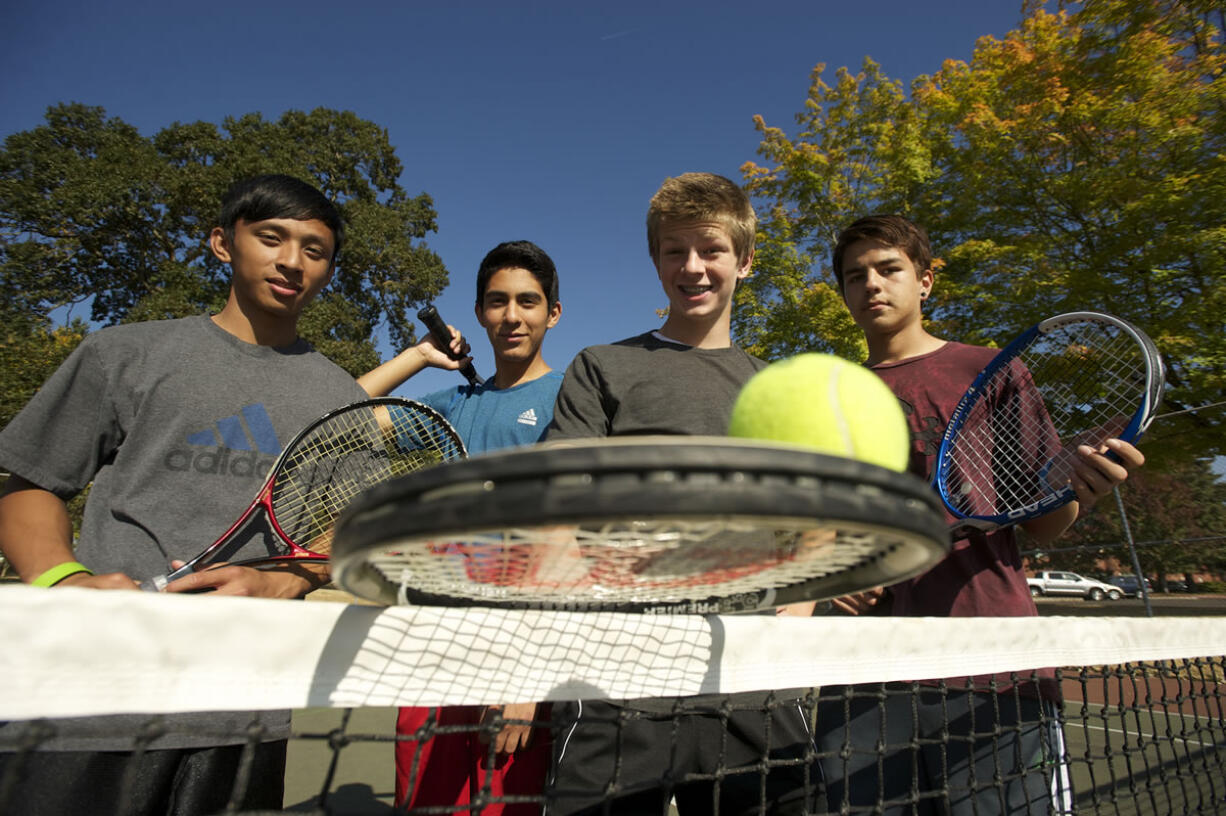 Part of the growing boys tennis program at Hudson's Bay High School are, from left: Thanh Vo, Saul Paez, Aaron Bode and Corbin Alexander.