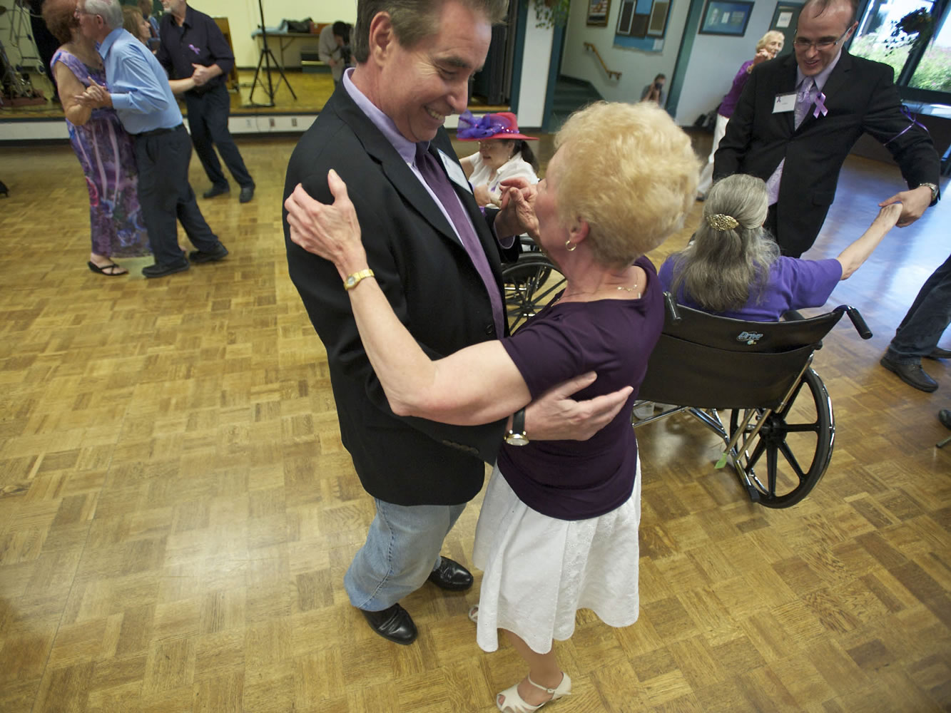 Lou Brancaccio and Pat Greear, 75, dance Thursday at the Luepke Senior Center to help raise awareness of senior abuse.