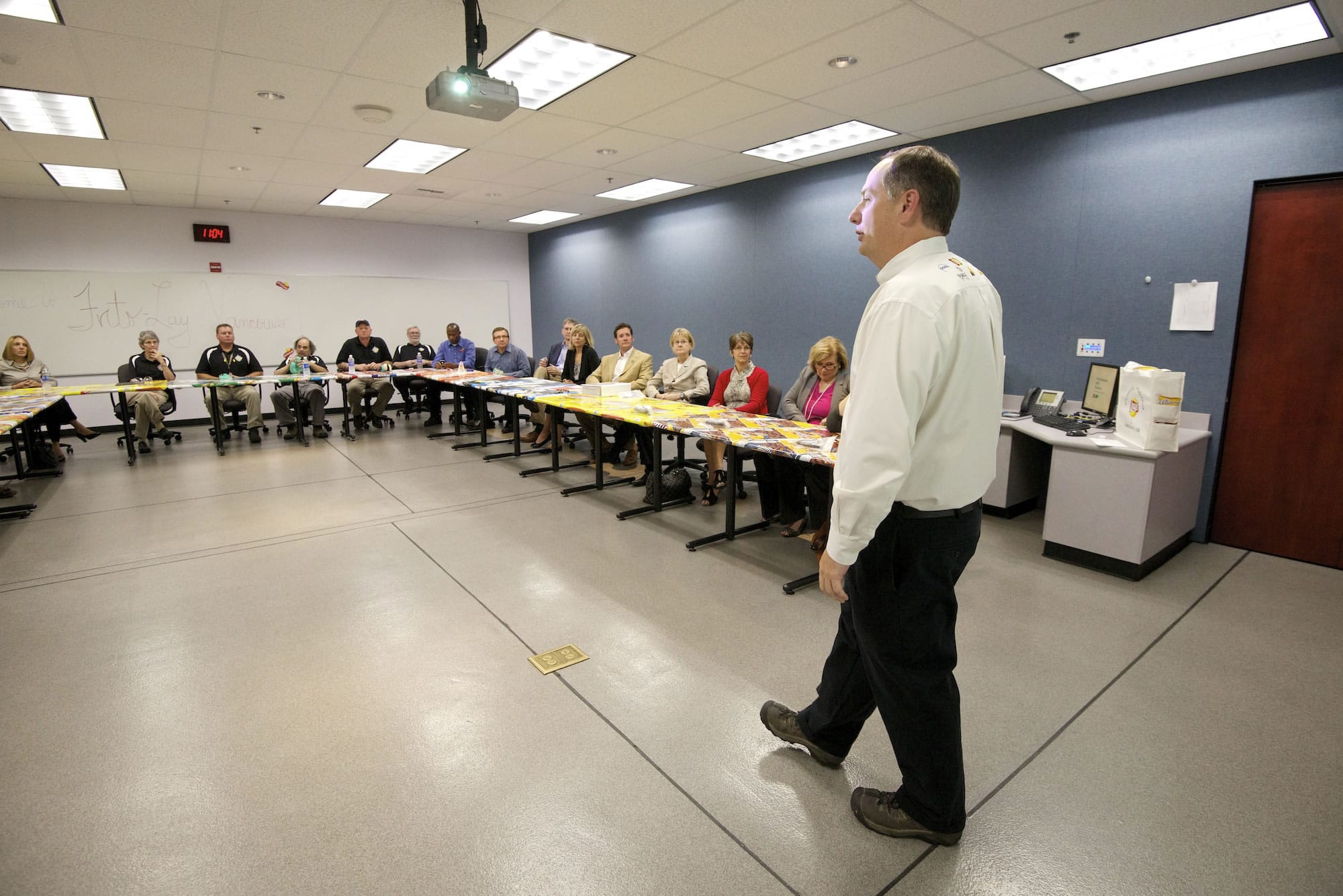 Jeff Ahner of Frito Lay talks about Frito Lay's history production and manufacturing processes, and the future of the company with Vancouver community leaders and employees at the Frito Lay Vancouver plant Thursday.