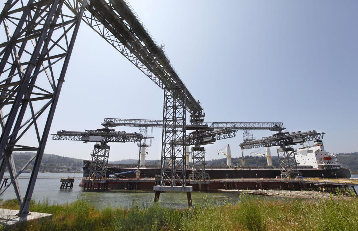 A grain ship loads at the EGT terminal at the Port of Longview.